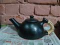 Black luxury kettle, traditional Indian crat